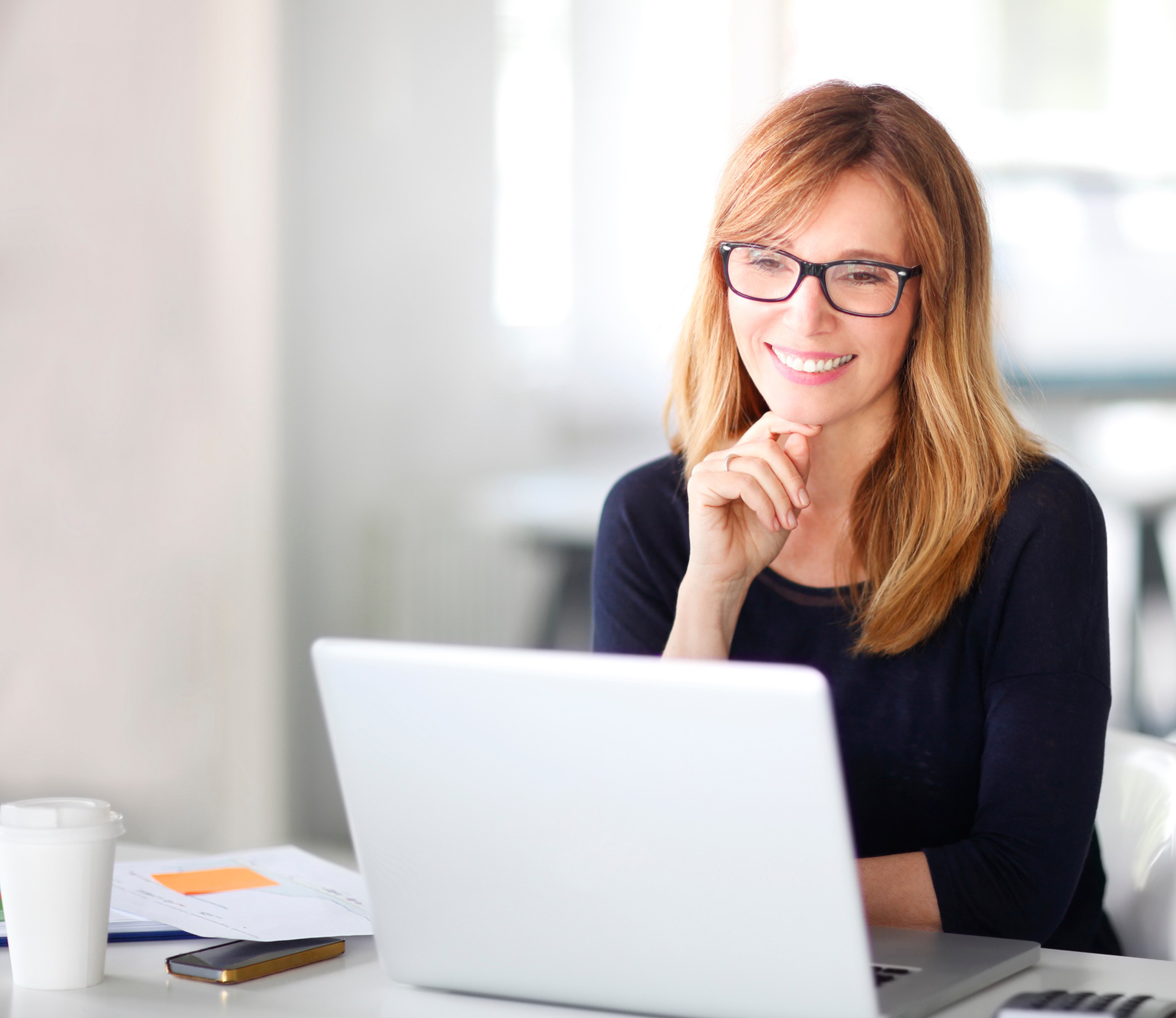 Professional woman working on laptop
